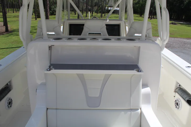 Slide: The Image of 2022 SeaVee 370Z boat interior with seating and console, showcasing modern design. - 30