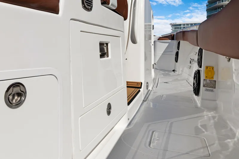 Slide: The Image of 2023 HCB Speciale boat interior with sleek white design and modern features. - 21