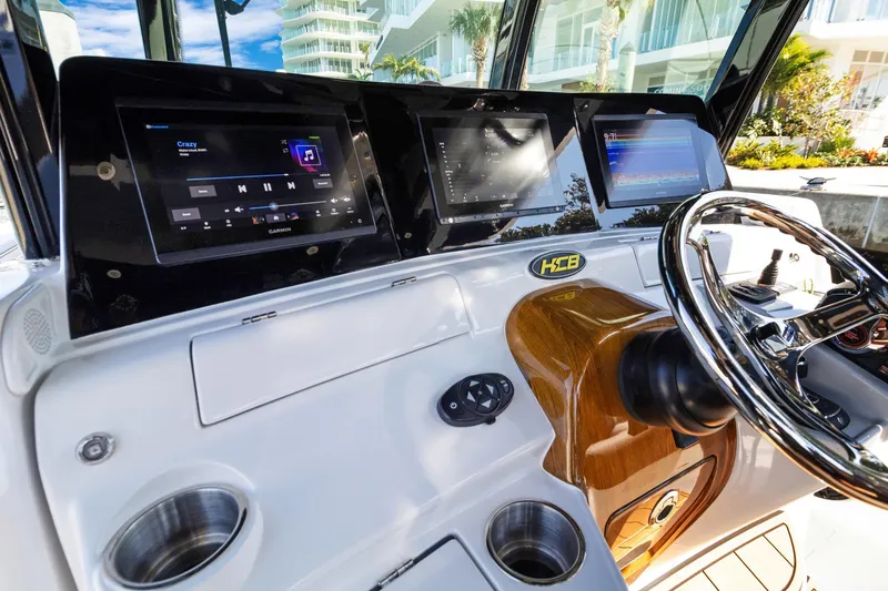 Slide: The Image of 2023 HCB Speciale boat dashboard with advanced navigation and entertainment systems. - 5