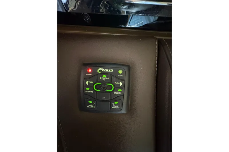 Slide: The Image of Control panel of a 2016 Formula 310 Bowrider boat with Axius system. - 10