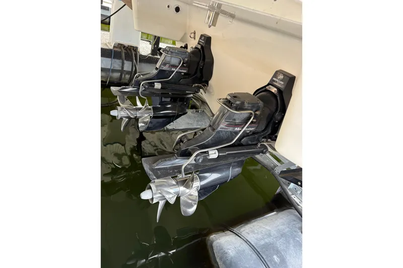 Slide: The Image of 2016 Formula 310 Bowrider with dual MerCruiser outboard engines in water. - 15