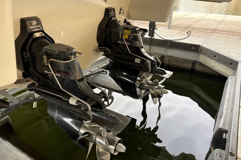 Slide: The Image of Dual Mercury MerCruiser Bravo Three outdrives on a 2016 Formula 310 Bowrider boat. - 16