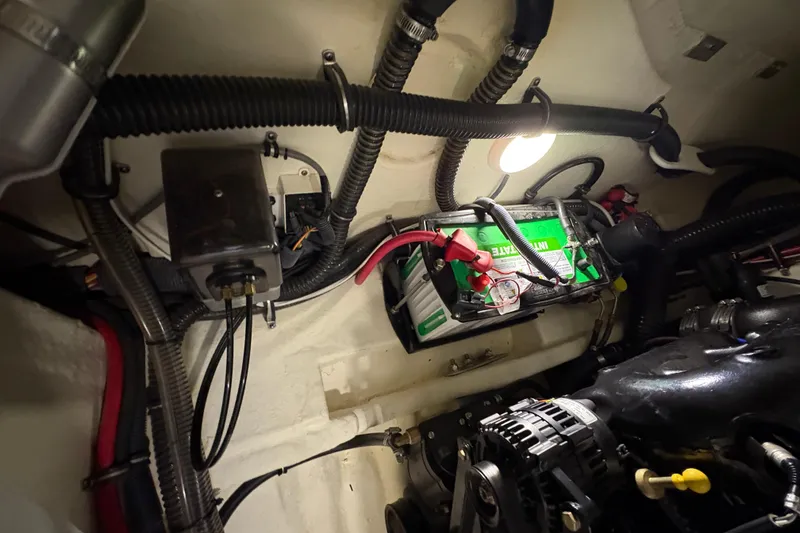 Slide: The Image of Engine compartment of 2016 Formula 310 Bowrider with battery and wiring. - 35