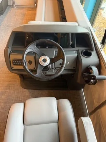 Slide: The Image of Interior view of Sun Tracker PB 18 boat, model year 2026. - 9