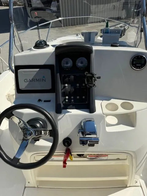 Slide: The Image of 2008 Boston Whaler 200 Dauntless helm with Garmin navigation system. - 14