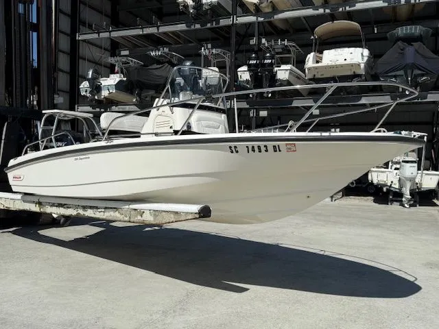 Slide: The Image of 2008 Boston Whaler 200 Dauntless boat in storage facility. - 3