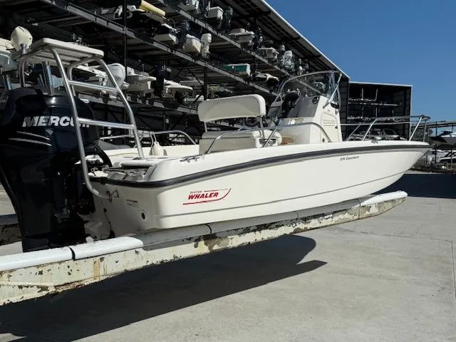 Slide: The Image of 2008 Boston Whaler 200 Dauntless boat on a dry dock. - 4