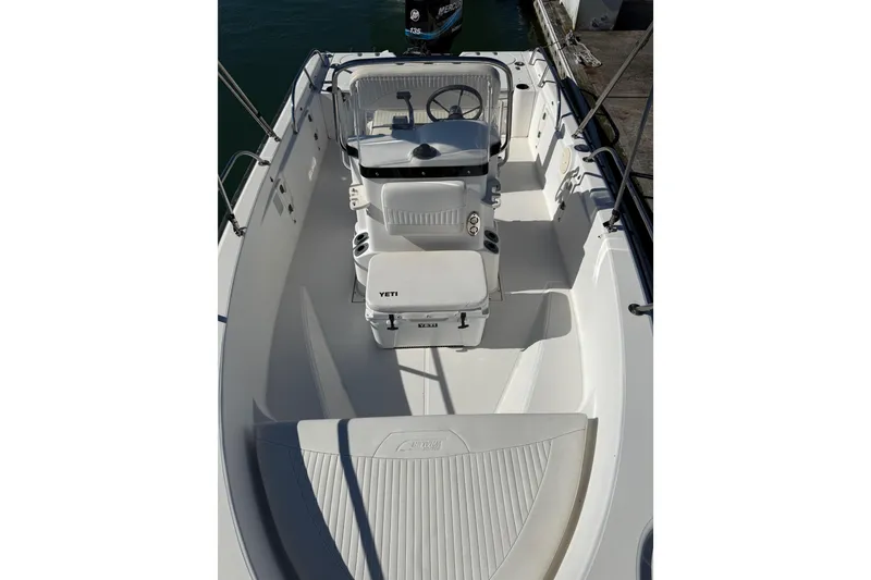 Slide: The Image of 2006 Boston Whaler 180 Dauntless boat interior with steering console and seating. - 4