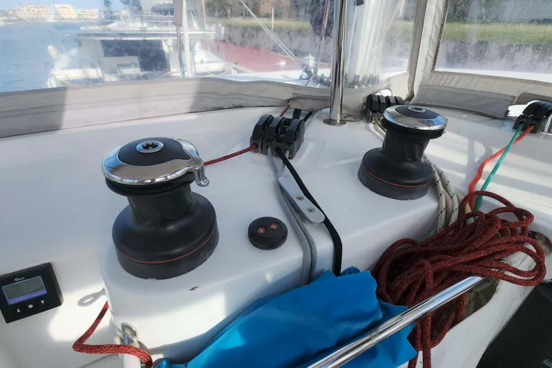 Slide: The Image of Cockpit of 2020 Lagoon 42 sailboat with winches and ropes. - 10