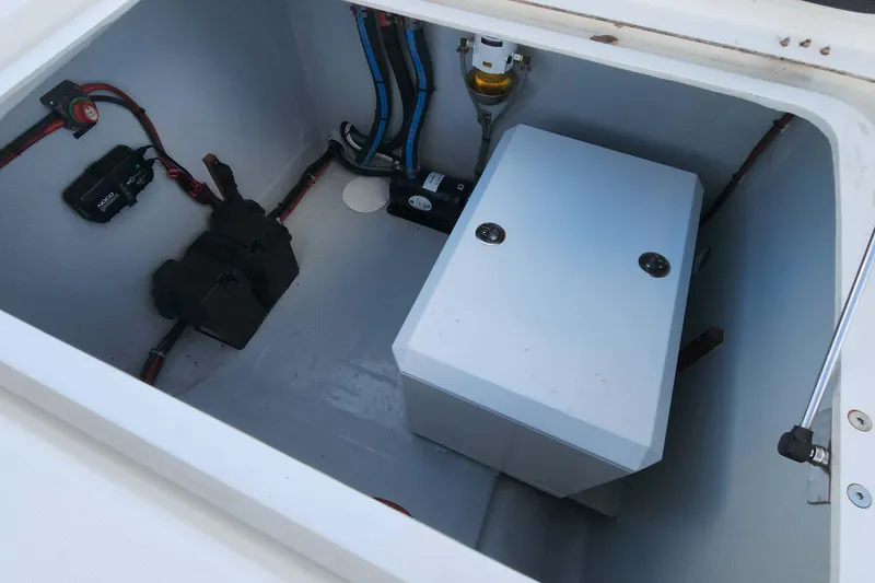 Slide: The Image of Electrical compartment of a 2020 Lagoon 42 catamaran with wiring and components. - 24