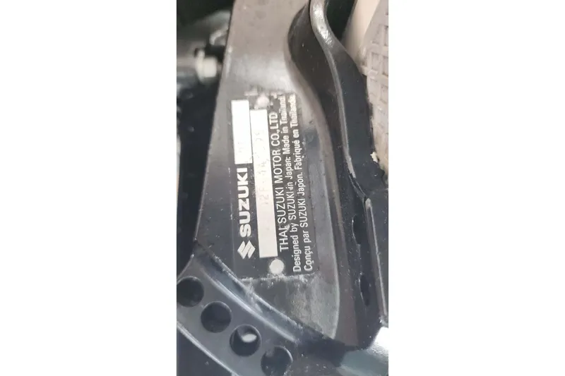 Slide: The Image of Label on Suzuki motor component, designed in Japan, made in Thailand. - 31