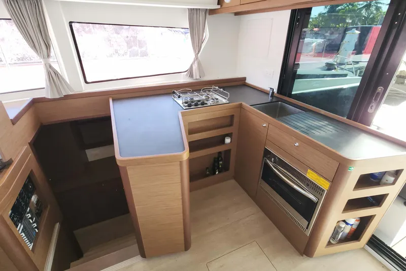 Slide: The Image of Modern kitchen in 2020 Lagoon 42 yacht with stove, oven, and sink. - 34