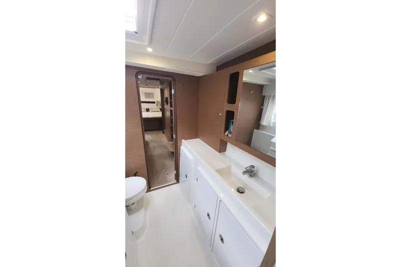 Slide: The Image of Modern bathroom interior of 2020 Lagoon 42 yacht, featuring sleek design and ample lighting. - 46