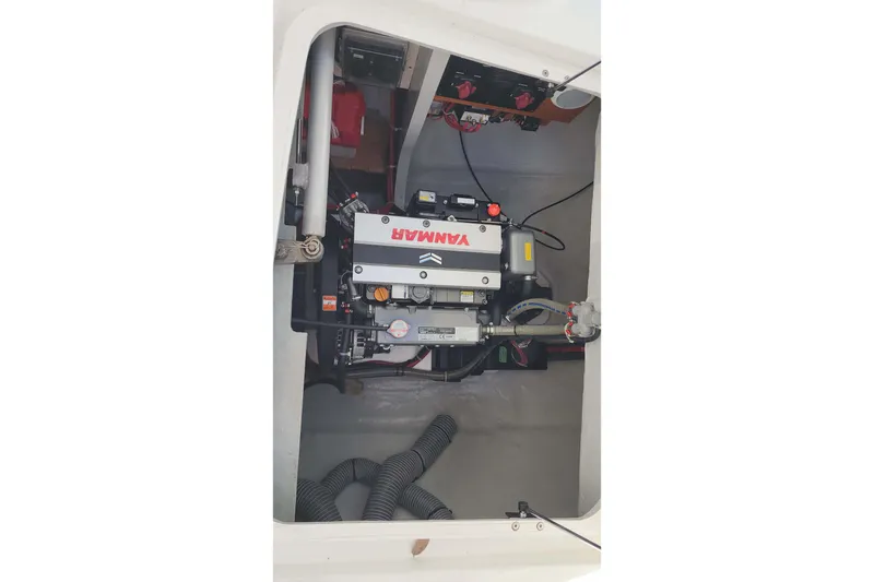Slide: The Image of Engine compartment of a 2020 Lagoon 42 catamaran featuring a Yanmar engine. - 61