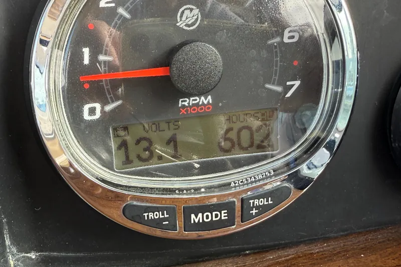 Slide: The Image of Close-up of 2016 Four Winns V335 tachometer displaying 13.1 volts and 602 hours. - 38