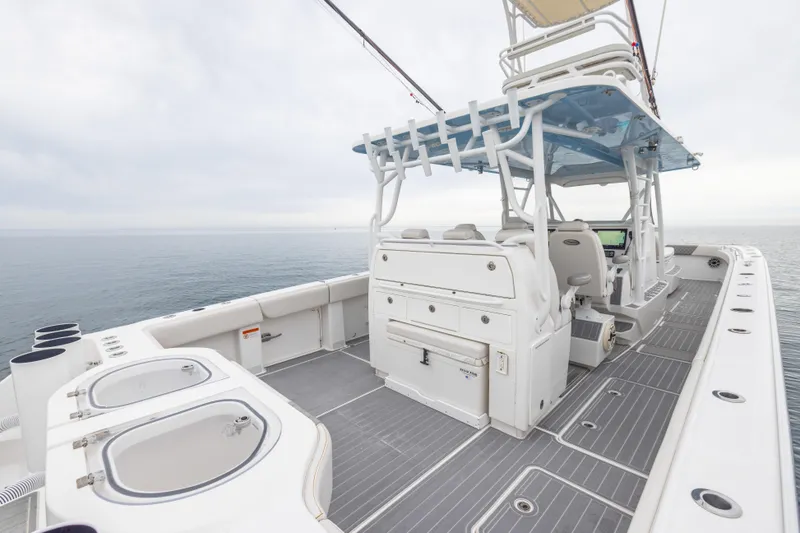 Slide: The Image of 2020 Invincible 40 Catamaran with spacious deck and modern amenities on open water. - 27