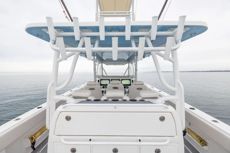 Slide: The Image of 2020 Invincible 40 Catamaran interior with helm, seating, and ocean view. - 28