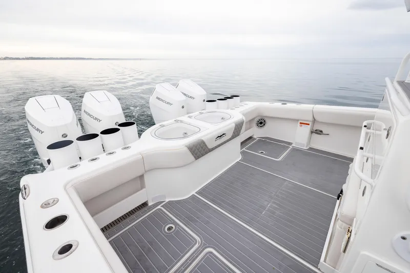 Slide: The Image of 2020 Invincible 40 Catamaran with Mercury engines on calm water. - 31