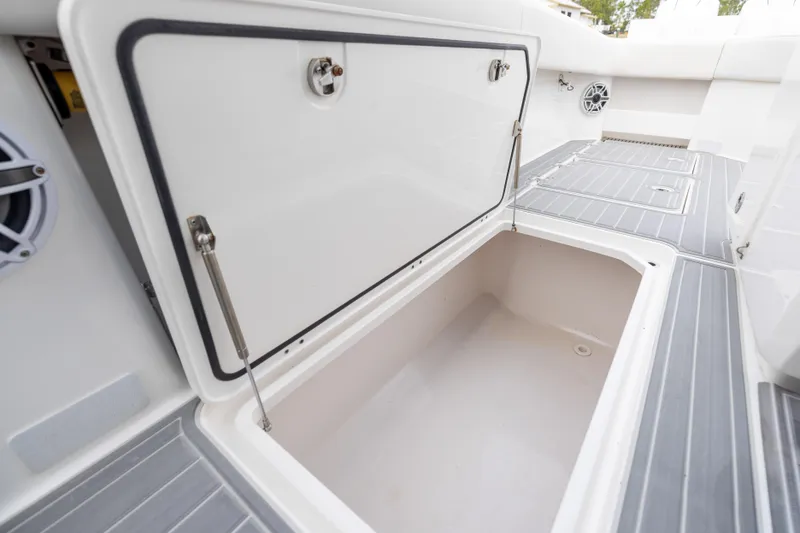 Slide: The Image of Open storage compartment on 2020 Invincible 40 Catamaran boat deck. - 43