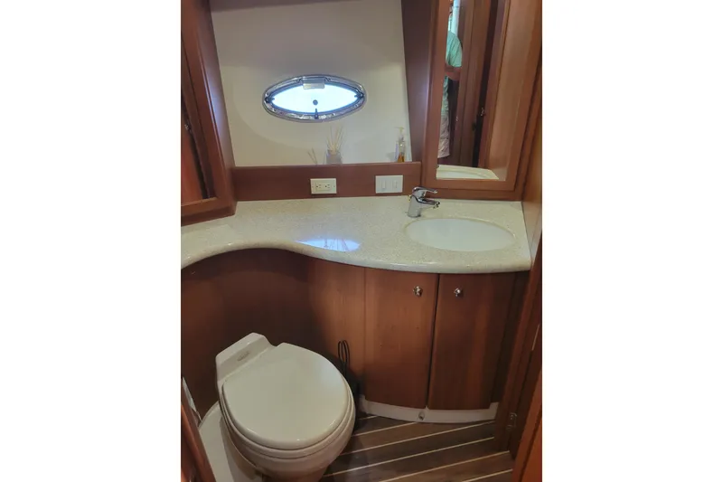 Slide: The Image of Bathroom interior of 2005 Silverton 43 Motor Yacht with sink and toilet. - 32