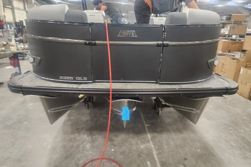 Slide: The Image of 2026 Avalon Catalina Quad Lounge Shift boat in a workshop setting. - 3