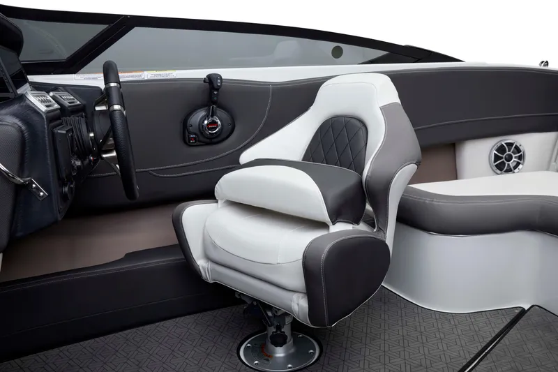 Slide: The Image of 2025 Crownline 220 SS LPX boat interior with luxury seating and modern controls. - 14
