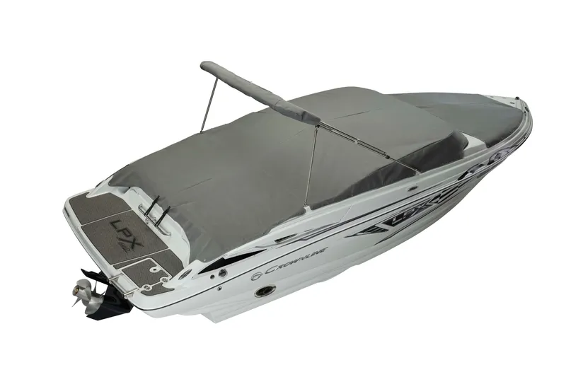 Slide: The Image of 2025 Crownline 220 SS LPX boat with gray cover and sleek design. - 19