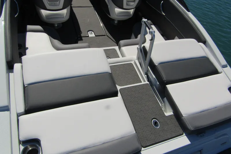 Slide: The Image of 2025 Crownline 220 SS LPX boat interior with sleek seating and modern design. - 8