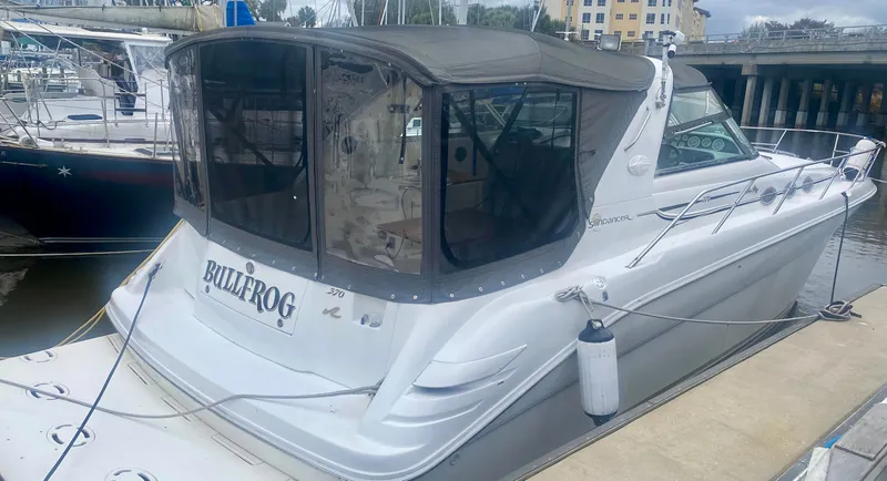 The Image of 1995 Sea Ray Sundancer 370 boat docked at marina. - 0