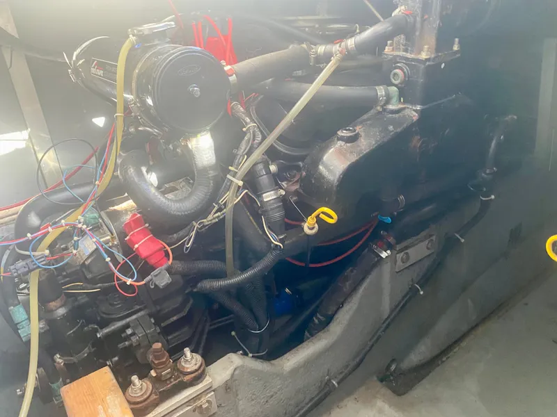 Slide: The Image of Engine compartment of a 1995 Sea Ray Sundancer 370 boat. - 14