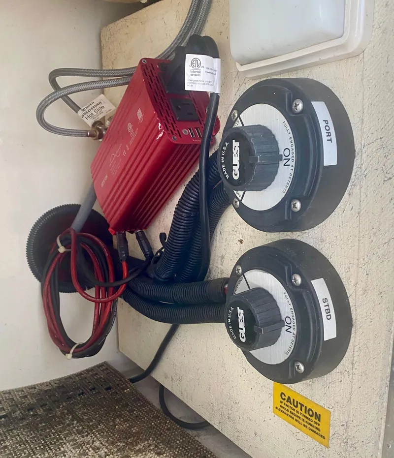 Slide: The Image of Electrical controls in a 1995 Sea Ray Sundancer 370. - 16