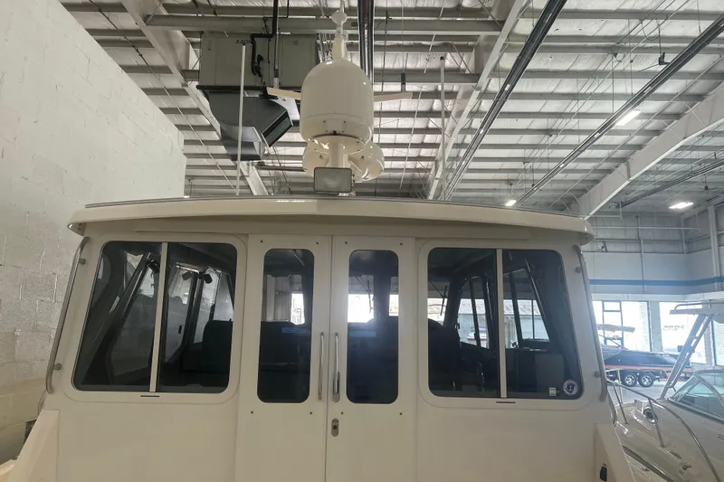 Slide: The Image of 2007 True North 38 Heritage boat in a spacious indoor storage facility. - 37