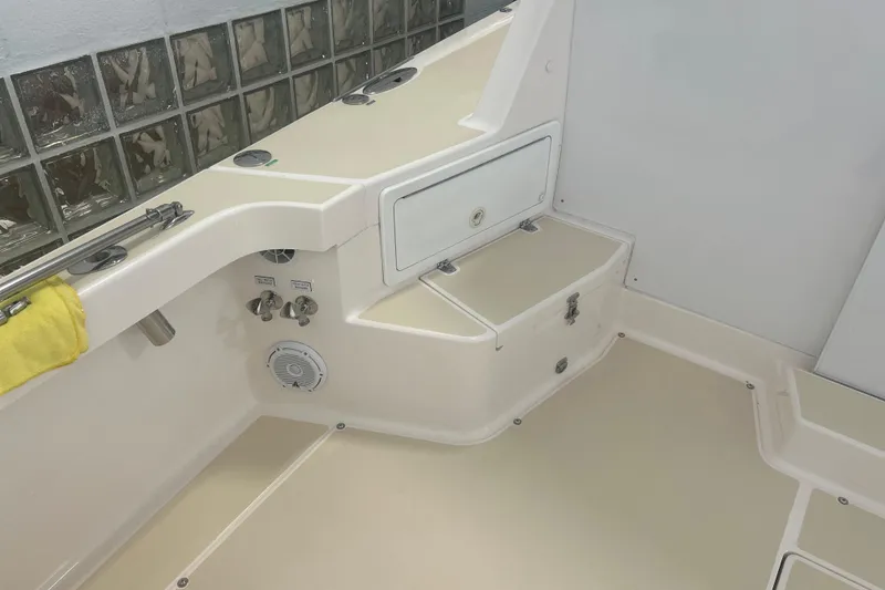 Slide: The Image of 2007 True North 38 Heritage boat interior with storage compartments and speaker. - 38