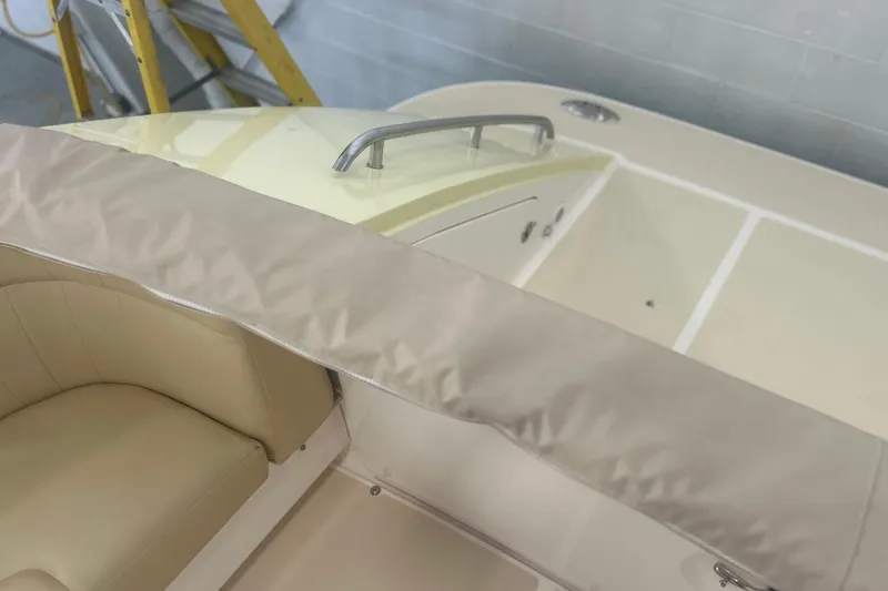 Slide: The Image of Interior view of a 2007 True North 38 Heritage boat with beige seating. - 43
