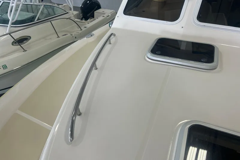 Slide: The Image of 2007 True North 38 Heritage boat deck with railing and hatch. - 6