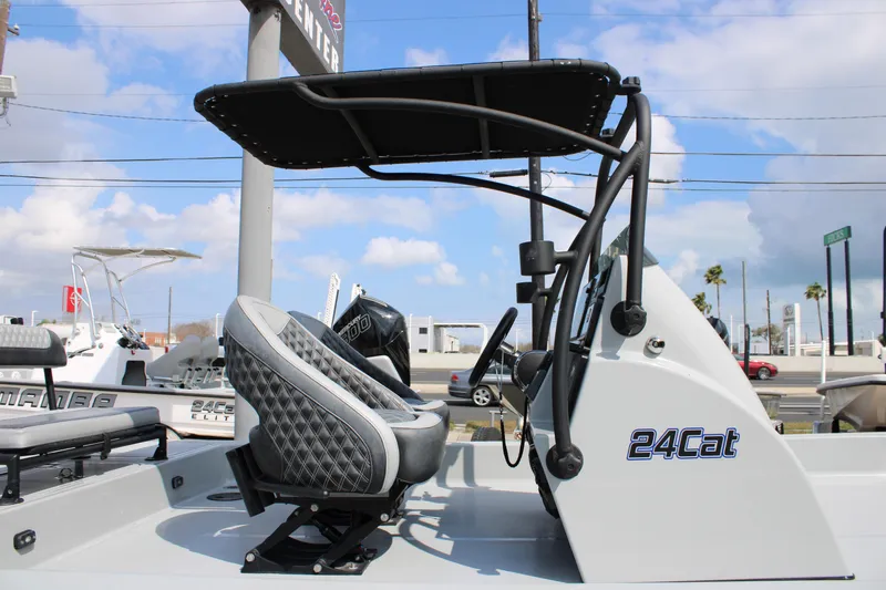 Slide: The Image of 2025 Mamba 24 Cat Elite boat with sleek seating and modern design. - 21