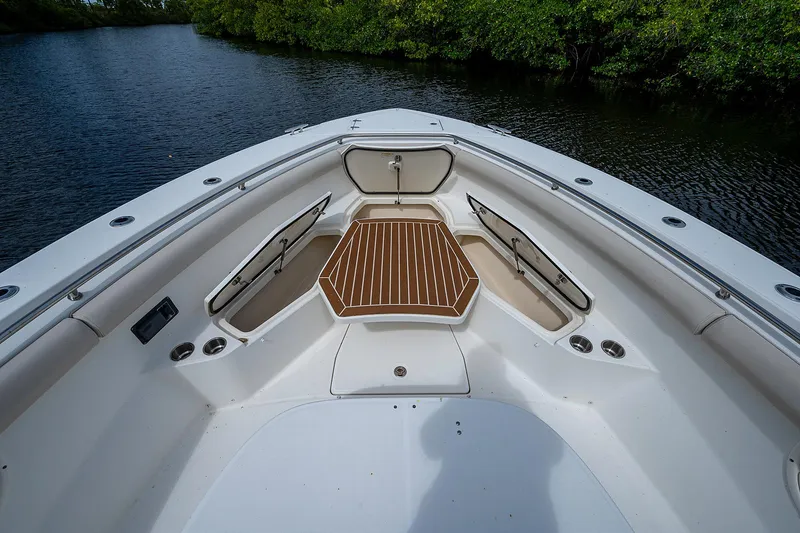 Slide: The Image of 2017 Boston Whaler 370 Outrage boat deck with seating and storage. - 47