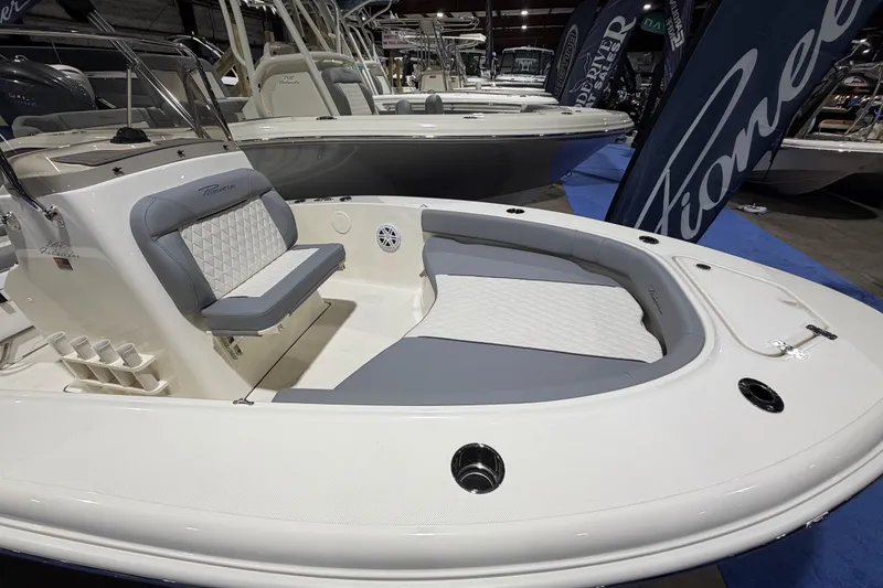 Slide: The Image of 2026 Pioneer 180 Islander boat with gray and white seating. - 4