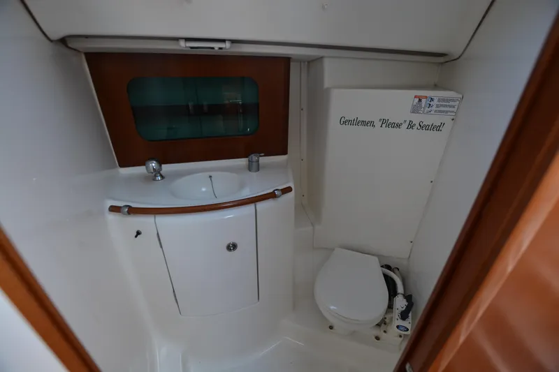Slide: The Image of 2002 Beneteau Oceanis 331 yacht bathroom with sink and toilet. - 9