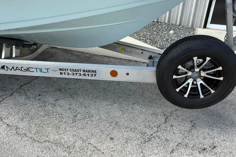 Slide: The Image of Trailer for 2026 Sea Pro 230 Bay boat by Magic Tilt, West Coast Marine. - 2