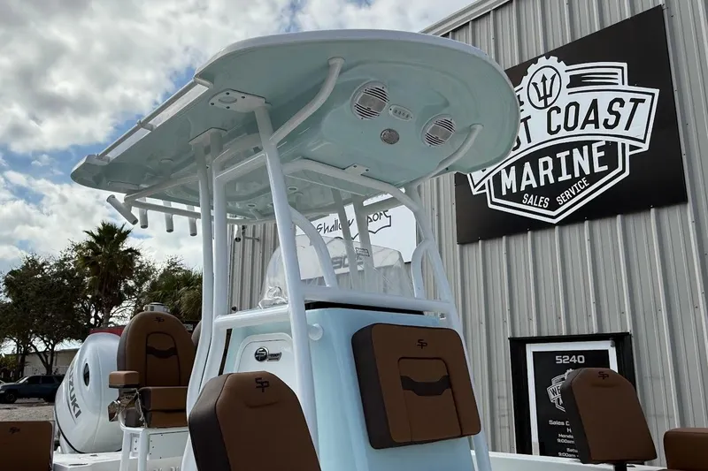 Slide: The Image of 2026 Sea Pro 230 Bay boat at West Coast Marine dealership, featuring sleek design and modern amenities. - 4