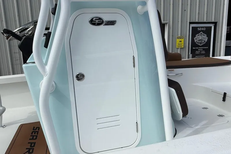 Slide: The Image of 2026 Sea Pro 230 Bay boat console with storage compartment and sleek design. - 6