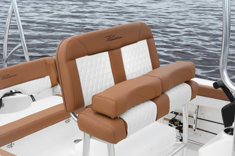 Slide: The Image of Manufacturer Provided Image: 2025 Pioneer 202 Islander boat seat with brown and white upholstery on water. - 5