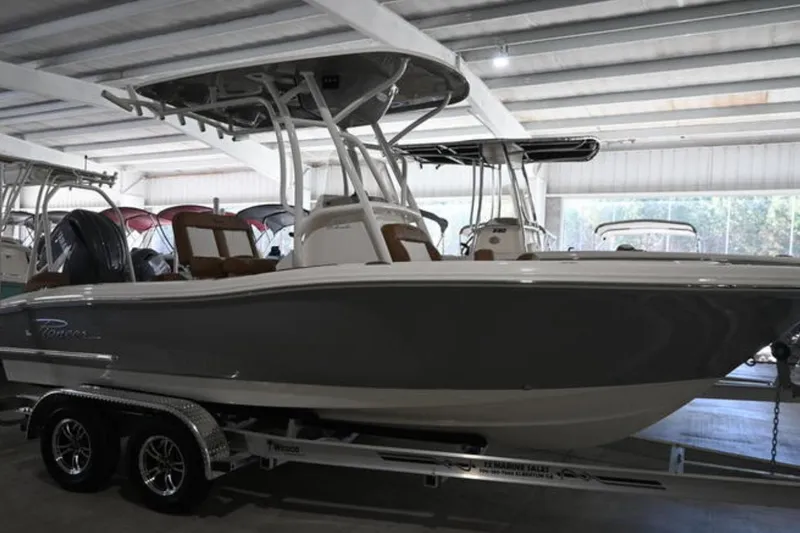 Slide: The Image of 2026 Pioneer 202 Islander boat on trailer in showroom. - 9