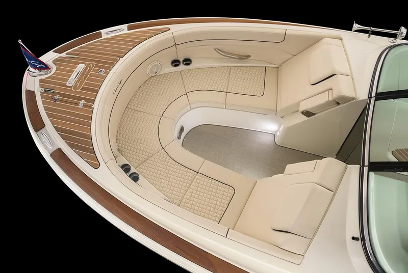 Slide: The Image of Manufacturer Provided Image: Luxurious 2025 Chris-Craft Launch 28 GT boat interior with elegant seating and teak accents. - 10