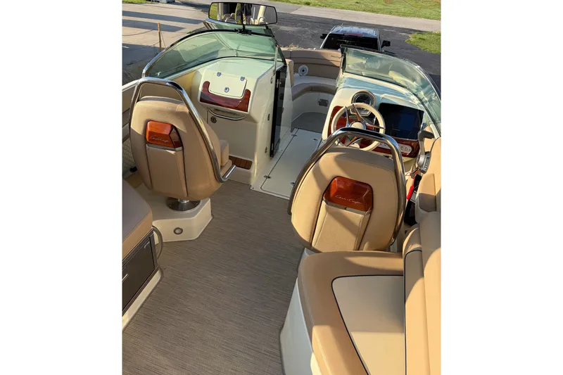 Slide: The Image of 2025 Chris-Craft Launch 28 GT interior with luxurious seating and modern dashboard design. - 21