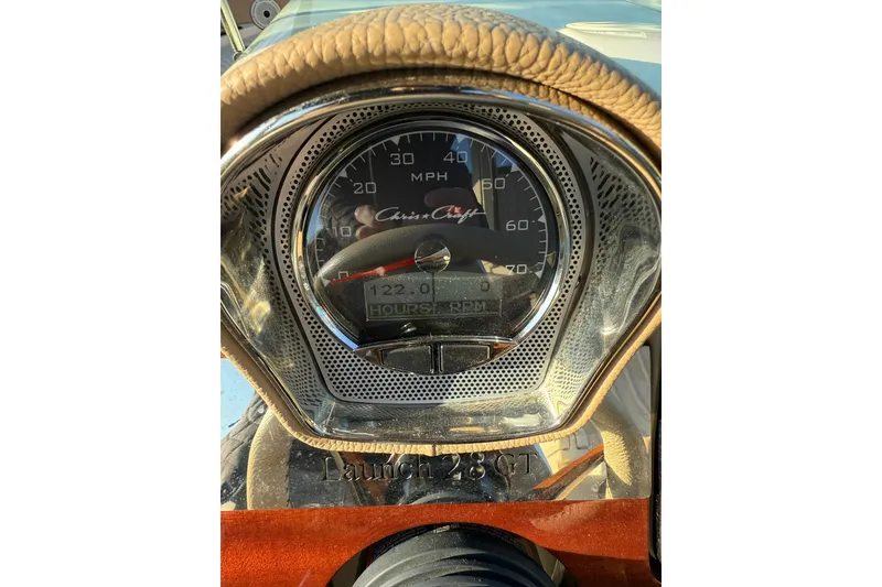 Slide: The Image of Dashboard of 2025 Chris-Craft Launch 28 GT, showing speedometer and hour meter. - 23