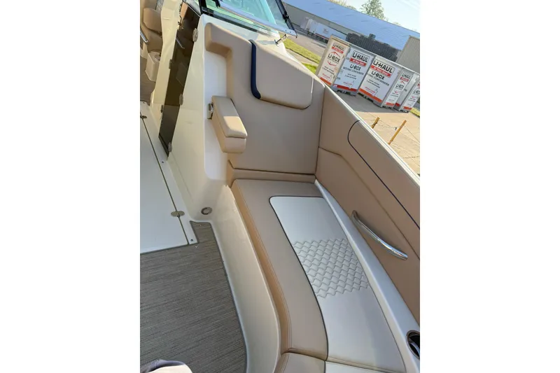 Slide: The Image of 2025 Chris-Craft Launch 28 GT interior with beige and white seating, showcasing luxury design. - 24