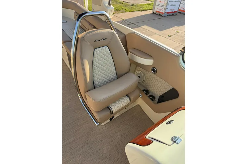 Slide: The Image of Luxurious interior of 2025 Chris-Craft Launch 28 GT boat with elegant seating design. - 26