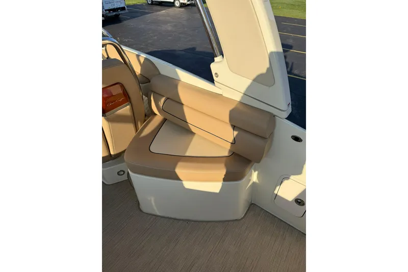 Slide: The Image of 2025 Chris-Craft Launch 28 GT boat interior with tan leather seating. - 29